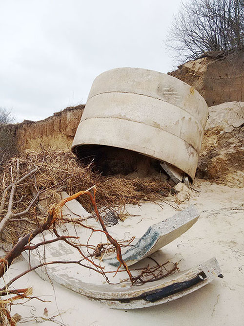 concrete on stormy beach